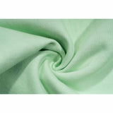 Green straight-leg sweatpants with reverse background technology.