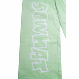 Green straight-leg sweatpants with reverse background technology.