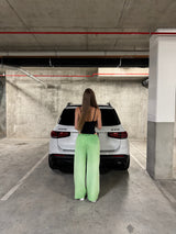 Green straight-leg sweatpants with reverse background technology.