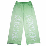 Green straight-leg sweatpants with reverse background technology.