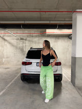 Green straight-leg sweatpants with reverse background technology.