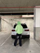 Green reversed background fleece hoodie with anti-bottom frying process.